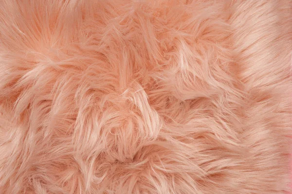 ミニマルなテクスチャコンセプト 素敵なフェイクファーの余分な柔らかいカバーをこねる 創造的なコピースペースと居心地の良いピンクの毛皮の背景 — ストック写真