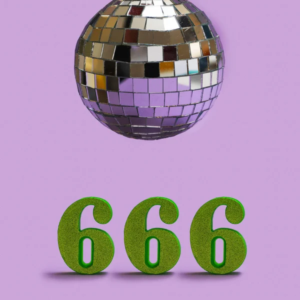 Minimal devil party concept. Three glitter green six numbers with a disco ball above it.  Very peri purple background.