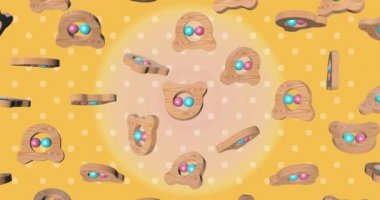 3d animation of a falling and rotating rattle and a rattle with a blue and pink ball. 3d rendering of a wooden childrens toy made by hand. banner for toy store or baby store with yellow background