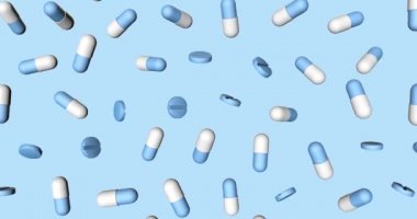 Düşen hapların, hapların ya da vitaminin üç boyutlu çizimi. Bir eczane ya da klinik reklamı için arka plan. Alfa katmanlı video görüntüleri ve arka plan ve rengini değiştirmek için bir maske