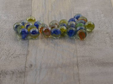 colored marbles scattered on the floor