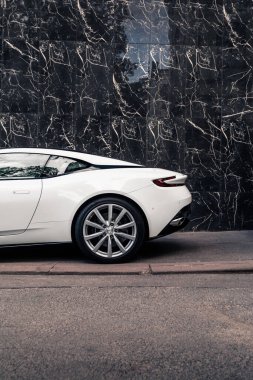 İngiliz süper arabası Aston Martin DB11 beyaz renkli. Kyiv, Ukrayna - Haziran 2021.