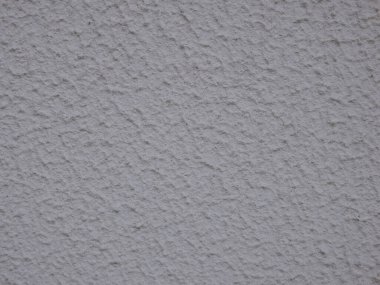 Beyaz dekoratif çimento sıva dokusu. Duvardaki beyaz beton dokudan soyut arkaplan.