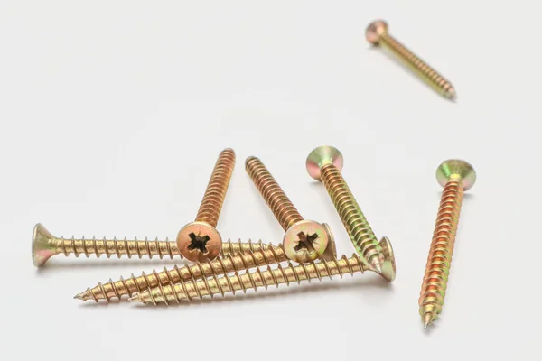 Bunch Yellow Screws White Background Yellow Construction Screws White Side — 스톡 사진