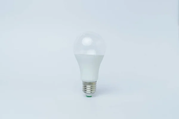 White led light bulb isolated on white background .
