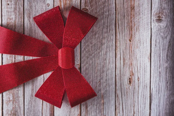 Fita Vermelha Decorativa Natal Fundo Madeira Espaço Para Cópia Foco — Fotografia de Stock