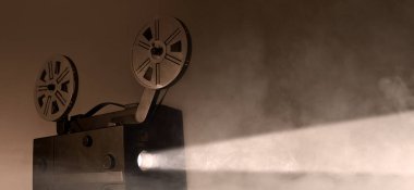 Film makaraları ve film çerçeveleriyle eski 8mm 'lik projektör. Uzayı kopyala Seçici odak.