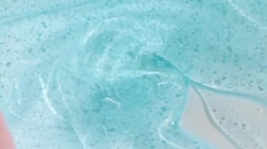 Sıvı krem, mavi kozmetik doku. Kaplama, karalama geçmişi. Organik kozmetik, ilaç. Üst Manzara. 4K