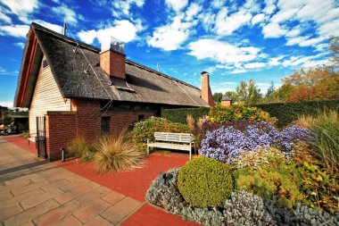 Garten der Welt (Dünya Bahçesi), Berlin, İngiliz kır evi