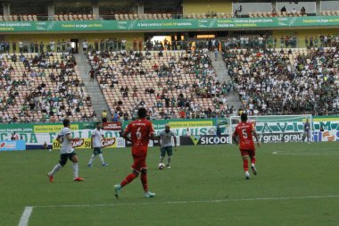 (SPO) Brezilya Futbol Şampiyonası 3. Lig: Manaus ve Tombense-MG. Manaus ile Tombense-MG arasında Brezilya Futbol Şampiyonası 3. Ligi için 30 Cumartesi günü Manaus 'taki Arena da Amazania Stadyumu' nda oynanan futbol maçı.). 