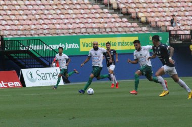 Yeşil Kupa Çeyrek finali: Manaus ve Remo: 12 Kasım 2021, Manaus, Amazonas, Brezilya: Manaus ve Remo arasında 12 Kasım Cuma günü Manaus 'taki Arena da Amazania stadyumunda oynanan Green Cup Soccer çeyrek finalleri için oynanan futbol maçı).