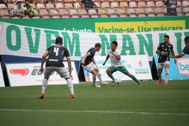 Yeşil Kupa Çeyrek finali: Manaus ve Remo: 12 Kasım 2021, Manaus, Amazonas, Brezilya: Manaus ve Remo arasında 12 Kasım Cuma günü Manaus 'taki Arena da Amazania stadyumunda oynanan Green Cup Soccer çeyrek finalleri için oynanan futbol maçı).