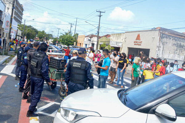 Student protest in Natal. December 2, 2021, Brazil, Natal, RN: City guards used rubber bullets and pepper spray to disperse student protests against the fare collection of the bus line connecting Avenida Salgado Filho to UFRN's University Campus