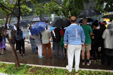 Sao Paulo 'da aşı pasaportuna karşı protesto. 14 Aralık 2021, Sao Paulo, Brezilya: Bir grup protestocu 1 Mayıs 'ta Sao Paulo Belediyesi' nde aşı pasaportunun sona ermesini isteyen bir protesto gösterisi düzenlediler.