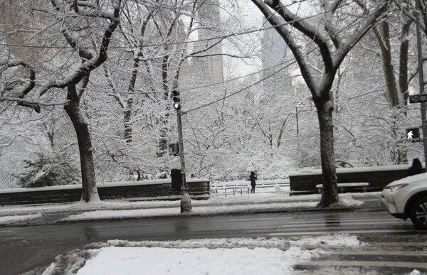 Snowfall at Central Park. January 7, 2022, New York, USA: The first awaited snowfall of 2022 at Central Park, New York with a winter weather advisory in effect for New York City until 12pm warning New Yorkers and tourists take caution while