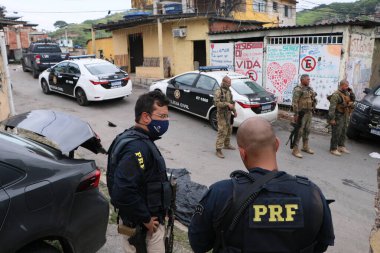 Rio de Janeiro, Vila Cruzeiro 'da polis operasyonunda sekiz kişi öldü. 11 Şubat 2022, Rio de Janeiro, Brezilya: 11 Şubat Cuma günü erken saatlerde Rio de Janeiro 'daki Vila Cruzeiro' da büyük bir polis operasyonu sırasında sekiz kişi hayatını kaybetti. 