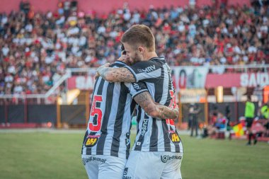 Mineiro Futbol Şampiyonası: Pouso Alegre ve Atletico-MG. 26 Haziran Cumartesi günü Pouso Alegre (MG) 'deki Manduzao Stadyumu' nda düzenlenen Mineiro Futbol Şampiyonası 'nın sekizinci turu için geçerli olan Pouso Alegre ile Atletico Mineiro arasında oynanan futbol maçı.