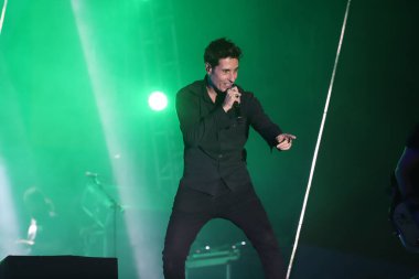 Brezilyalı grup Capital Inicial, Brezilya 'nın Sao Paulo şehrinde düzenlenen Rock Müzik Festivali' nde sahne aldı. 27 Mart 2022, Sao Paulo, Brezilya: Brezilyalı grup Capital Inicial, Latin Amerika Memorial 'da' Rock Müzik Festivali 40 Yıl 'sırasında sahne aldı.