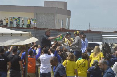 Brezilya Cumhurbaşkanı Jair Bolsonaro Parnamirim 'de Rio Grande do Norte eyaletinde bir tren istasyonunun açılışında. 30 Mart 2022, Parnamirim, Rio Grande do Norte, Brezilya: Brezilya Cumhurbaşkanı Jair Bolsonaro 'ya bakanlar eşlik etti