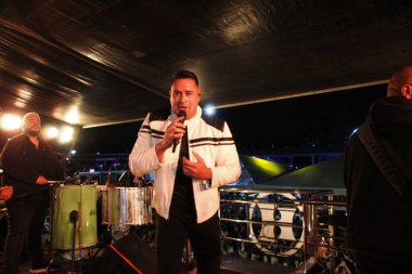 Mikareta Curitiba Folia 'da Harmonia do Samba grubunun sunumu. 3 Nisan 2022, Curitiba, Parana, Brezilya: Cumartesi günü Jokey Arena 'da gerçekleşecek Micareta Curitiba Folia' nın 2022 sayısında Harmonia do Samba grubunun sunumu 