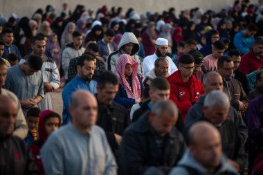 Palestinian Muslims perform Eid al-Fitr prayers. May 3, 2022, Gaza, Palestine: Palestinian Muslims perform Eid al-Fitr prayers at sunrise to mark the end of the holy month of Ramadan in the southern Gaza Strip.