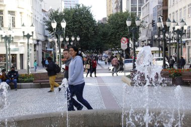 50th anniversary of the XV Street Boardwalk, in Curitiba. May 19, 2022, Curitiba, Parana, Brazil: Pedestrian movement on the famous Calcadao da Rua XV (XV Street Boardwalk), in downtown Curitiba