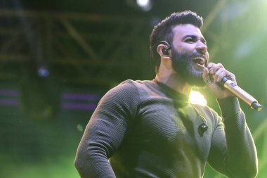 Brezilyalı şarkıcı Gustavo Lima, Sao Paulo 'da canlı performans sergiliyor. 11 Haziran 2022, Votarantim, Sao Paulo, Brezilya: Brezilyalı şarkıcı Gustavo Lima, Votorantim, Sao Paulo 'da düzenlenen hayır etkinliği Haziran ayında düzenlenen festivalde canlı performans sergiliyor..