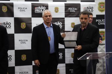Sao Paulo Valisi ve yetkililer, uyuşturucu kaçakçılığıyla mücadele eden bir polis olan Denarc Müzesi 'nin açılış törenine katıldılar. 15 Haziran 2022, Sao Paulo, Brezilya Sao Paulo Valisi Rodrigo Garcia, Delegado Olim