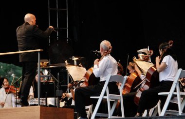 Central Park 'taki New York Filarmoni Konserleri. 15 Haziran 2022, New York, ABD: COVID-19 salgınından dolayı iki yıl aradan sonra New York Filarmoni Orkestrası Parktaki Konserleri tekrar Central Park 'ta