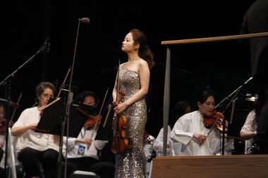 Central Park 'taki New York Filarmoni Konserleri. 15 Haziran 2022, New York, ABD: COVID-19 salgınından dolayı iki yıl aradan sonra New York Filarmoni Orkestrası Parktaki Konserleri tekrar Central Park 'ta