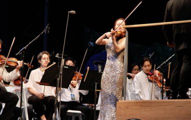 Central Park 'taki New York Filarmoni Konserleri. 15 Haziran 2022, New York, ABD: COVID-19 salgınından dolayı iki yıl aradan sonra New York Filarmoni Orkestrası Parktaki Konserleri tekrar Central Park 'ta