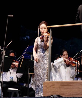 Central Park 'taki New York Filarmoni Konserleri. 15 Haziran 2022, New York, ABD: COVID-19 salgınından dolayı iki yıl aradan sonra New York Filarmoni Orkestrası Parktaki Konserleri tekrar Central Park 'ta