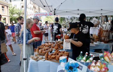 FIAFS Bastille Day in New York. July 10, 2022, New York, USA: The FIAFS Bastille Day, celebrating Frances National Day, in New York is taking place on Madison Avenue from 59th to 63 street with French cuisine