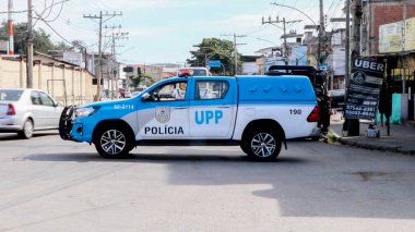 Rio de Janeiro 'da polisle suçlular arasında ölümcül çatışmalar. 12 Temmuz 2022, Rio de Janeiro, Brezilya: Rio de Janeiro 'nun Kuzey Bölgesi' nde Manguinhos 'da Avenida Leopoldo Bulhoes' da meydana gelen silahlı saldırı, 12 Salı günü en az altı kişinin ölümüne neden oldu.).