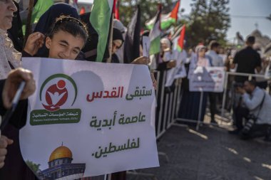 Filistinliler, ABD Başkanı Joe Biden 'ın Cisjordania ziyaretine karşı düzenlenen protestoya katıldılar. 14 Temmuz 2022, Gazze Şeridi, Filistin Bölgesi: ABD Başkanı Joe Biden ilk Orta Doğu gezisi için Çarşamba günü İsrail 'e geldi