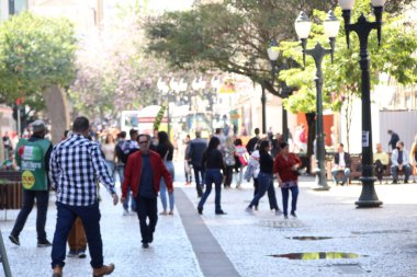 Nice temperature day in the city of Curitiba. July, 19, 2022, Curitiba, Parana, Brazil: Movement in downtown Curitiba after two rainy days with low temperatures, on Tuesday (19), with firm and sunny weather in the capital of Parana. 