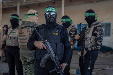 Hamas holds military parade to remember Israel's 2014 offensive. July 20, 2022, Gaza  Strip, Palestine: Brigadiers from Al-Qassam, the military wing of the Islamic resistance movement Hamas clipart