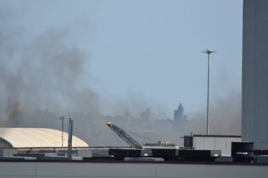 Large fire amidst extreme heat in Jersey City, NJ. July 24, 2022, Jersey City, NJ, USA: Large fire at a scrap yard in Jersey City, NJ on July 24, 2022.