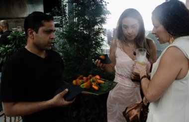 (New York 'ta G10 Favelas Yardım Yemeği. 27 Temmuz 2022, New York, ABD: Brezilya G10 Favelas, G10 Favelas Haftası sırasında Chelsea-New York 'taki Selina Hotel' in çatısında bir bağış yemeği düzenledi.