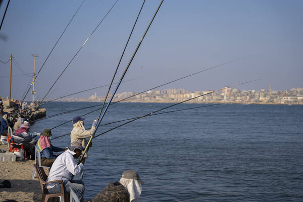 Palestinians fish in the sea surrounding the Gaza Strip. August 2, 2022, Gaza, Palestine: Palestinian citizens practice fishing in the sea that bathes the Gaza Strip, in Palestine, on  Tuesday (2).