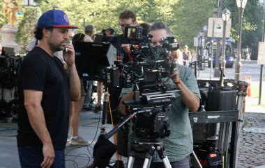 (NEW) Shooting of a commercial in New York. August 06, 2022, New York, USA:  The shooting of a commercial on 5th avenue in New York attracting curious eyes of passerby. It is common to see streets and avenues reserved for movie /commercial shootings 