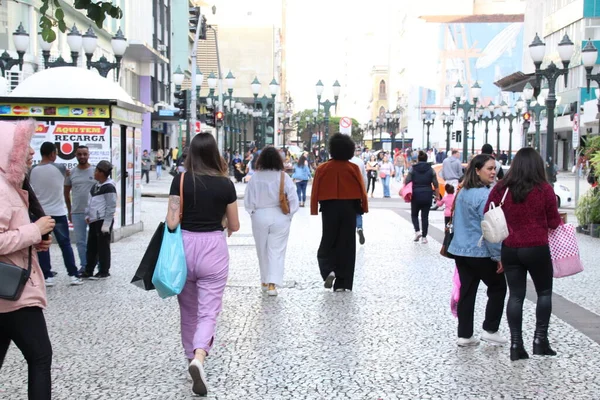 Movement in Commerce in Curitiba on the eve of Father's Day. August 13, 2022, Curitiba, Parana, Brazil: Movement of consumers in commerce in downtown Curitiba, on Saturday (13), eve of Father's Day. 
