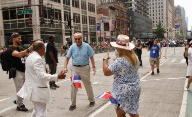 (NEW) US Senate Leader Chuck Schumer during Dominican Day Parade 2022. August 14, 2022, New York, USA: US Senate Leader Chuck Schumer during the Dominican Day Parade 2022 which is back for in person parade after the suspension due to the COVID-19 pan