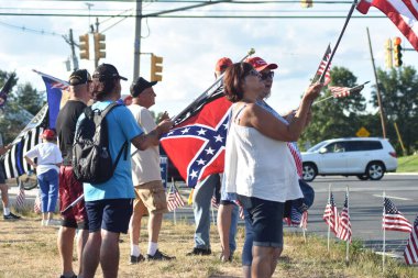 Supporters of former President of the United States Donald J. Trump rally and participate in a vehicle parade near Trump National Golf Club in Bedminster, New Jersey to support President Trump following the FBI raid at Mar-a-Lago in Palm Beach