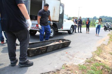 Man's body is found quartered in Manaus. August 21, 2022, Manaus, Amazonas, Brazil: A male body, not identified by the police, was found on Sunday (21), quartered inside a fiber bag, in front of a company on  Hibisco Avenue 