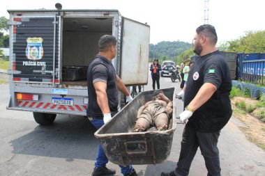 Man's body is found quartered in Manaus. August 21, 2022, Manaus, Amazonas, Brazil: A male body, not identified by the police, was found on Sunday (21), quartered inside a fiber bag, in front of a company on  Hibisco Avenue 