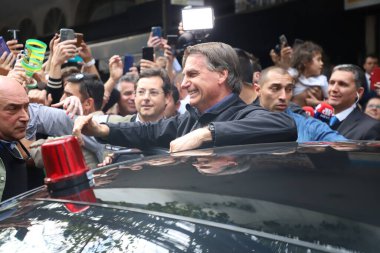 Brazilian President and Reelection Candidate Jair Messias Bolsonaro Interacts With Supporters in Sao Paulo. August 26, 2022, Sao Paulo, Brazil: Jair Renan, youngest son of President Jair Bolsonaro clipart