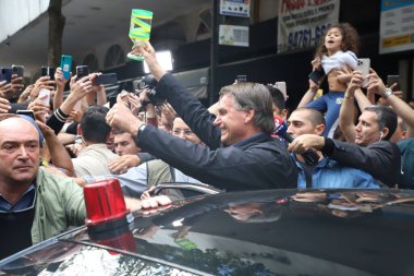 Brazilian President and Reelection Candidate Jair Messias Bolsonaro Interacts With Supporters in Sao Paulo. August 26, 2022, Sao Paulo, Brazil: Jair Renan, youngest son of President Jair Bolsonaro clipart