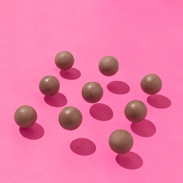 Creative Composition Made Brown Chocolate Balls Sunshine Shadows Vibrant Pink — Foto de Stock