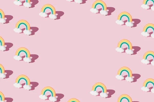 Small Colorful Rainbow Cookie Clouds Pattern Pink Background Copy Space — Stock Fotó